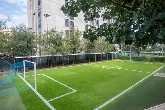 Family space with soccer field, gym, and pool - Image 2